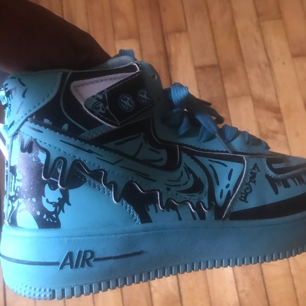 One Piece custom Nike Air Max shoes with Ace on the sides of shoe